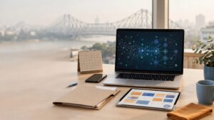 Laptop with customer data graphics beside business tools on a tidy desk.